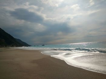 Scenic view of beach against sky