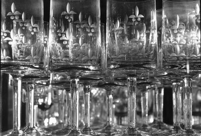 Full frame shot of glass bottles on table