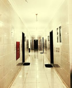 Empty corridor with building in background