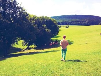 Man standing on grassy field