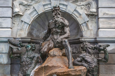 Statue of fountain in historic building