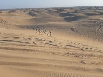 Scenic view of desert against sky