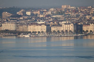 View of river and buildings in city