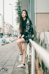 Full length portrait of beautiful woman
