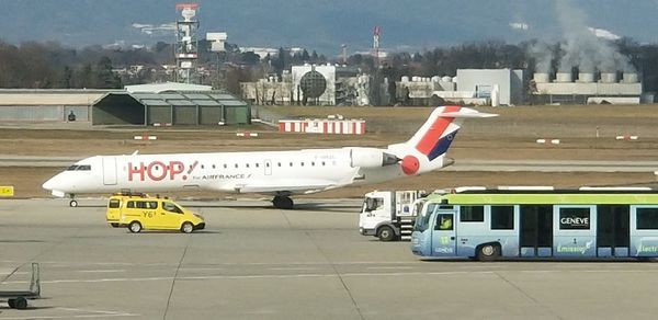 View of airplane at airport runway