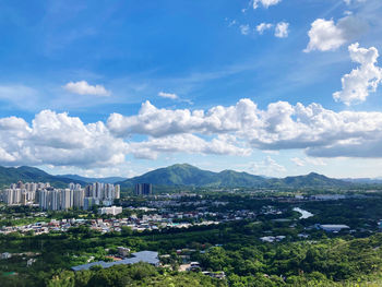 Aerial view of townscape against sky