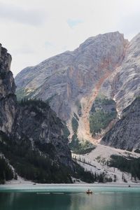 Scenic view of mountains and lake against sky