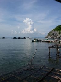 Scenic view of sea against cloudy sky