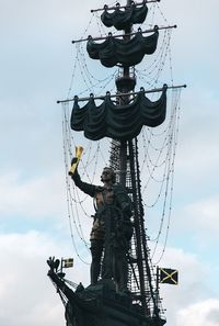 Low angle view of statue against sky