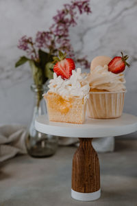 Close-up of cut cupcake on table