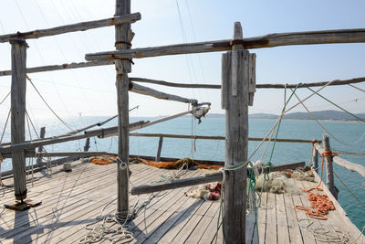 View of pier on sea against sky