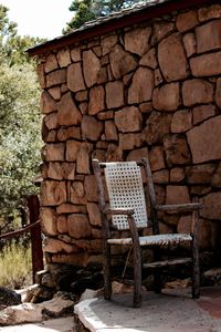 Empty chairs in front of building