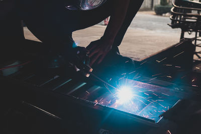 Welder, welding automotive part in a car factory