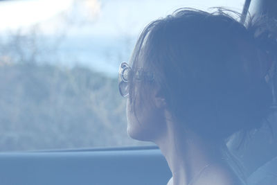 Close-up of woman in car