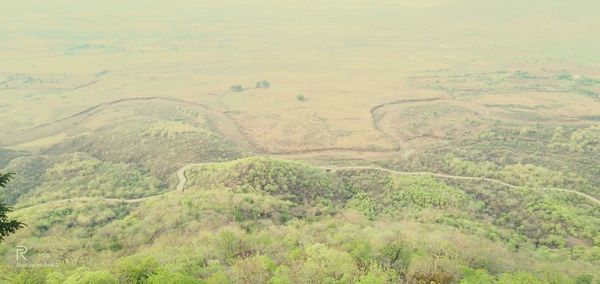 High angle view of land against sky