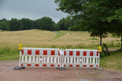 Barricade against grassy field