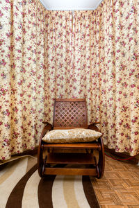 Wooden rocking chair in the room