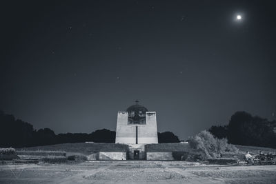 Church against clear sky at night