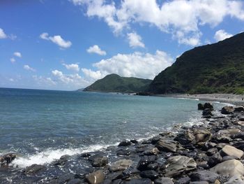 View of sea against cloudy sky