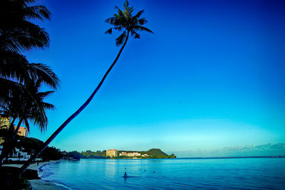 Scenic view of sea against clear blue sky