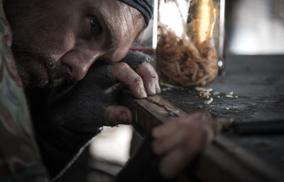 Close-up of man preparing food