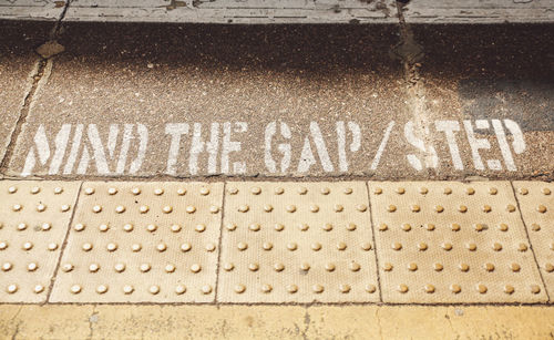 Close-up of text on wall