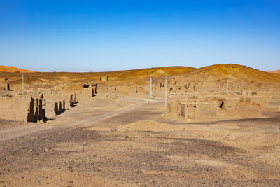 Scenic view of desert against clear sky