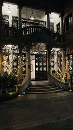 Low angle view of illuminated building in city