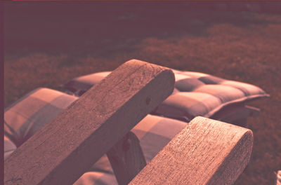 Close-up of empty lounge chair in yard