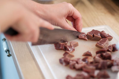 Midsection of man preparing food