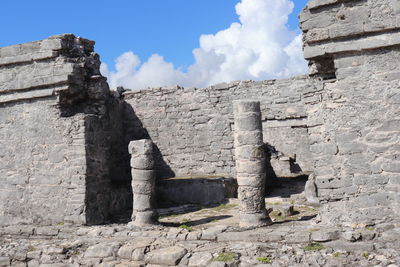 View of old ruin building against cloudy sky