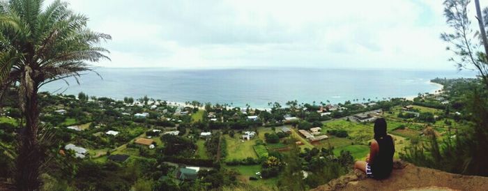 Scenic view of sea against cloudy sky