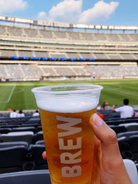 Close-up of hand holding drink