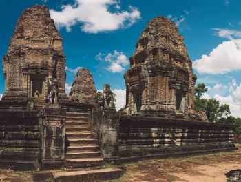 Old temple building against sky