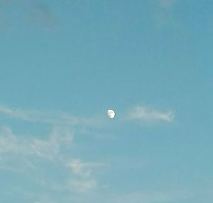 Low angle view of moon against sky