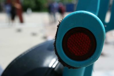 Close-up of red pipe in city