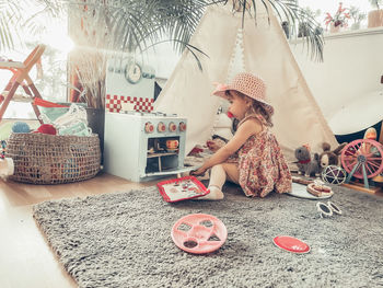 Portrait of a child playing in her room