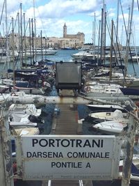 Boats moored at harbor