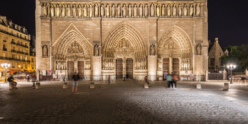 People at historic building