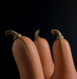 Close-up of banana against black background