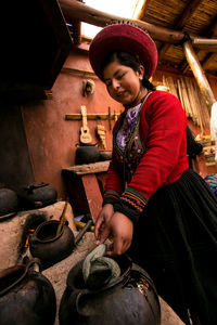 Young woman standing on floor