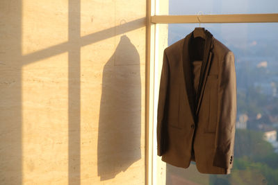 Clothes drying against wall