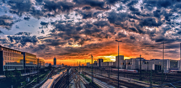High angle view of train against sky at sunset