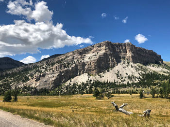 Scenic view of landscape and mountains against sky