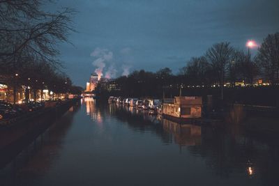 Reflection of illuminated buildings in water at night