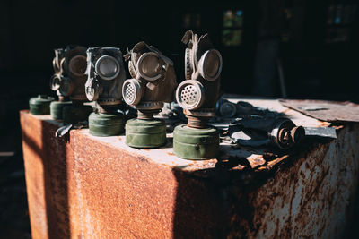 Close-up of old gas masks