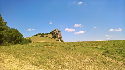 Scenic view of land against sky