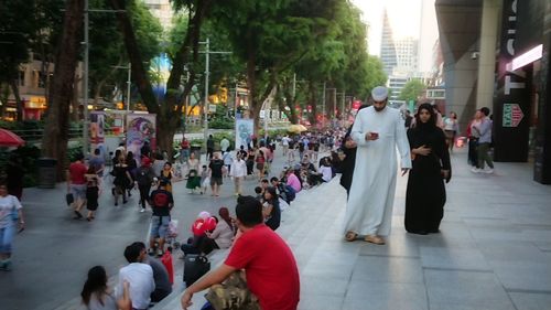 People on street in city