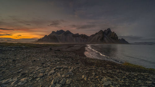 Dramatic evening sunset sky over vestrahorn mountain in stokksnes, iceland