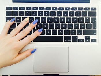 Cropped image of woman holding hands